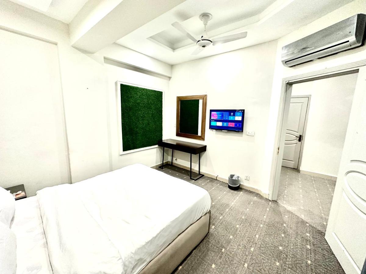 Mudan Hotel And Suite Islamabad Værelse billede